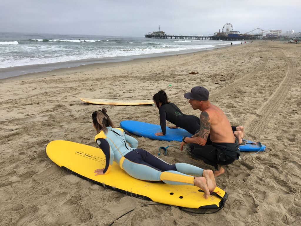 Surfers taking surf lessons in Los Angeles